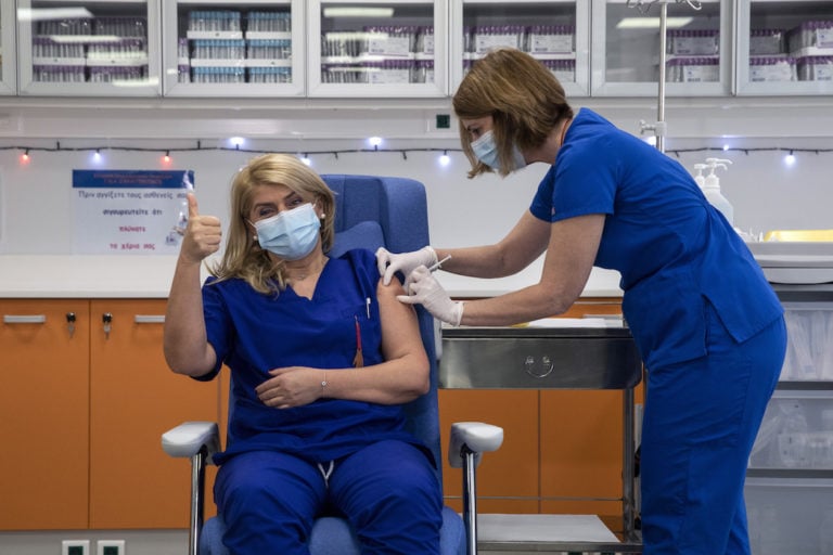 A Nurse And A Nursing Home Resident The First People Vaccinated In