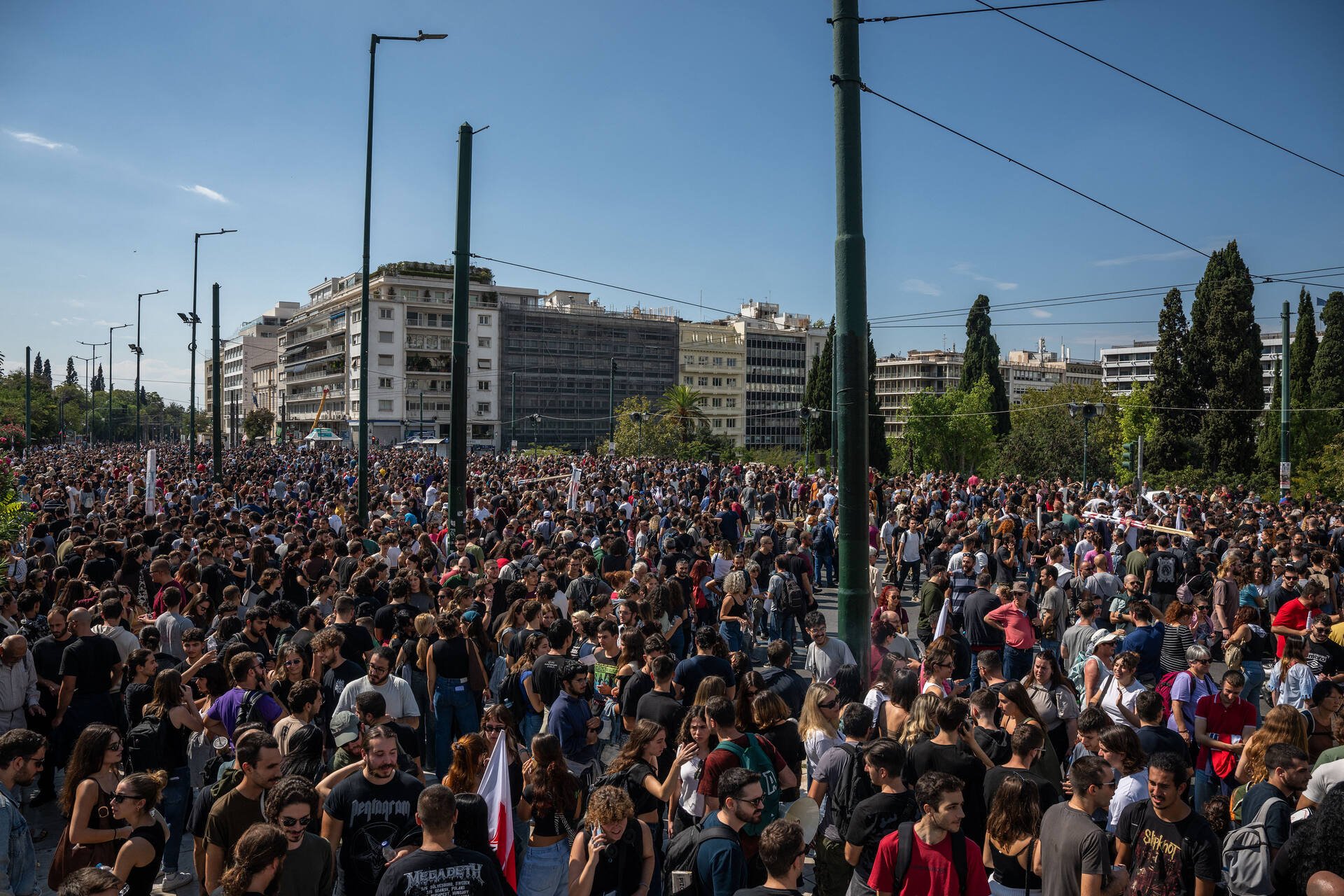 Greek ferries, trains halted as thousands protest