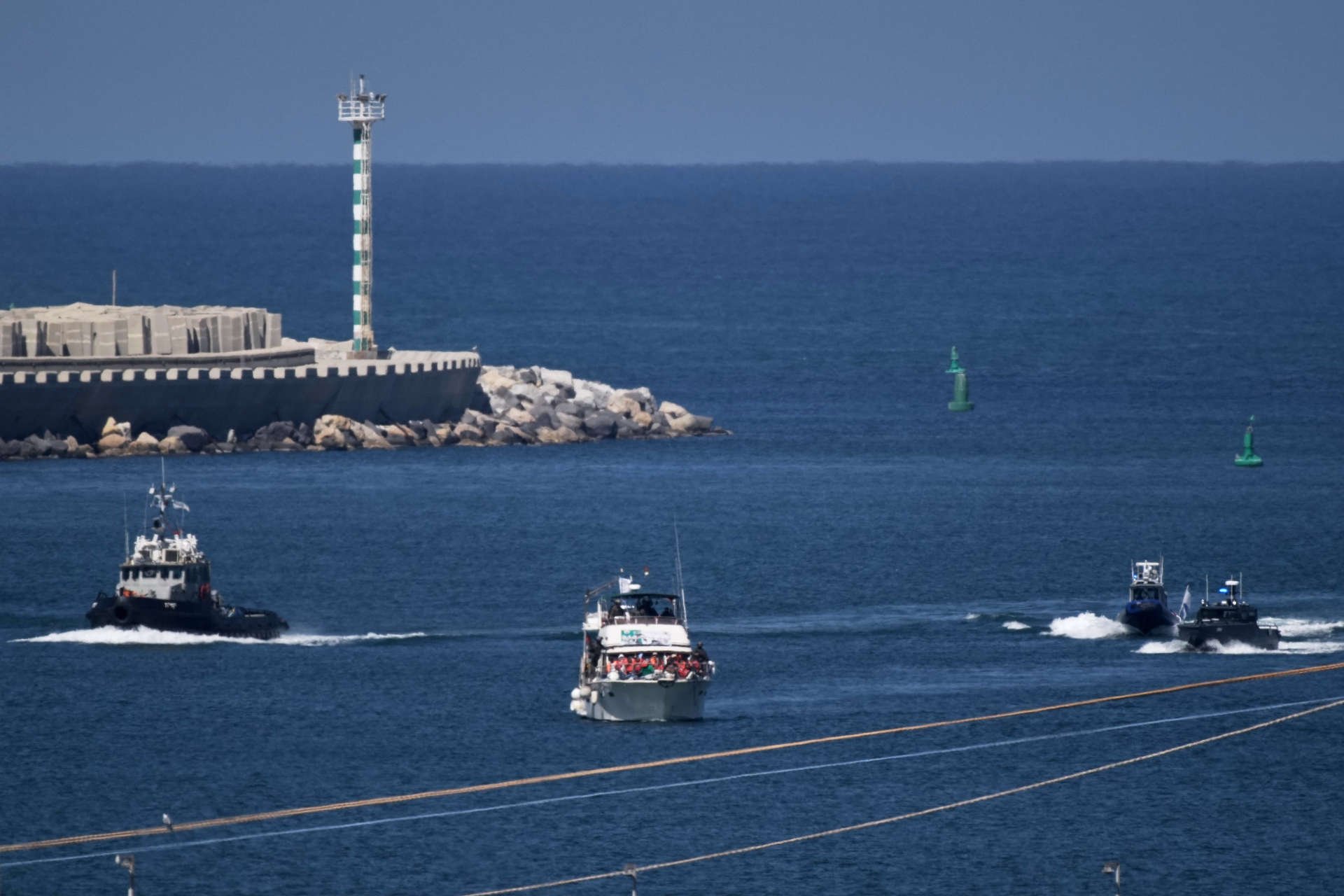 Activists shipped to shore from blocked Gaza flotilla – Australians detained